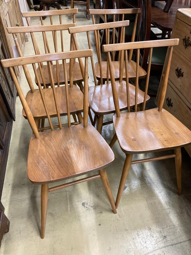 A set of six Ercol dining chairs